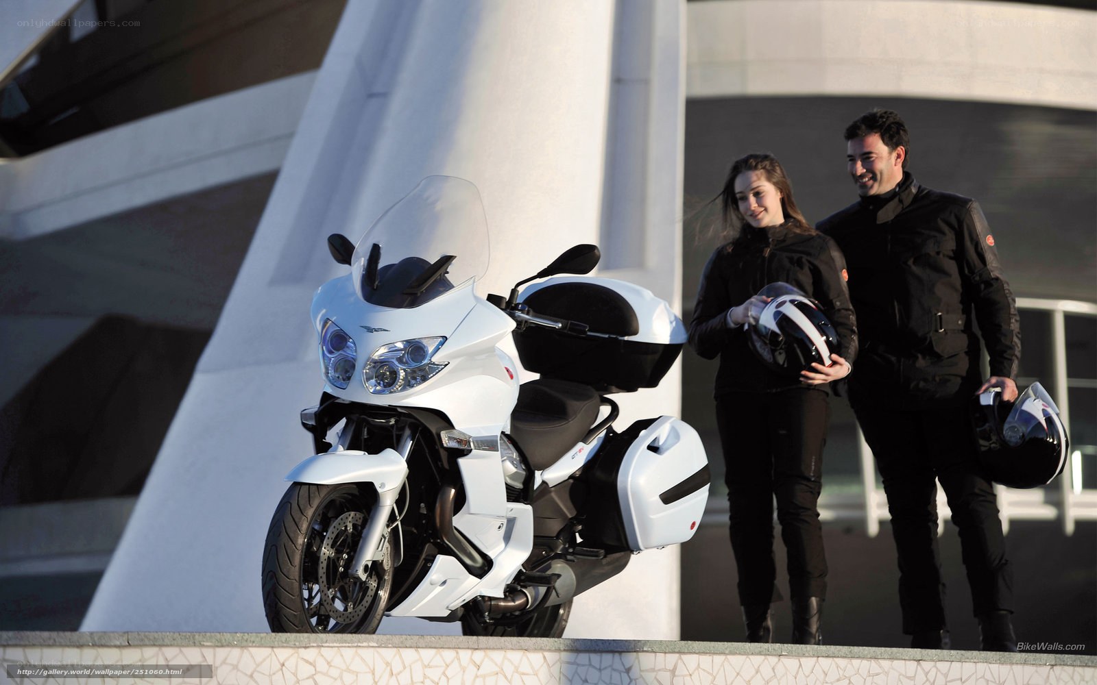 Couple with white motorcycle