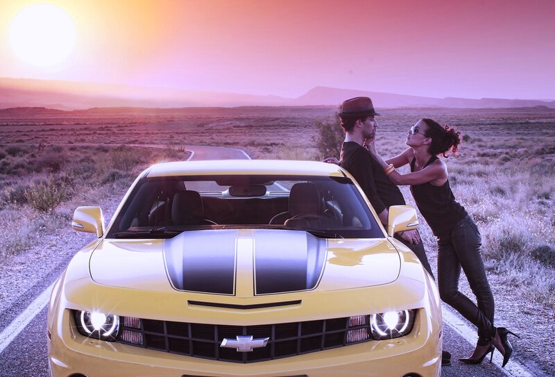 Couple with Yellow Car