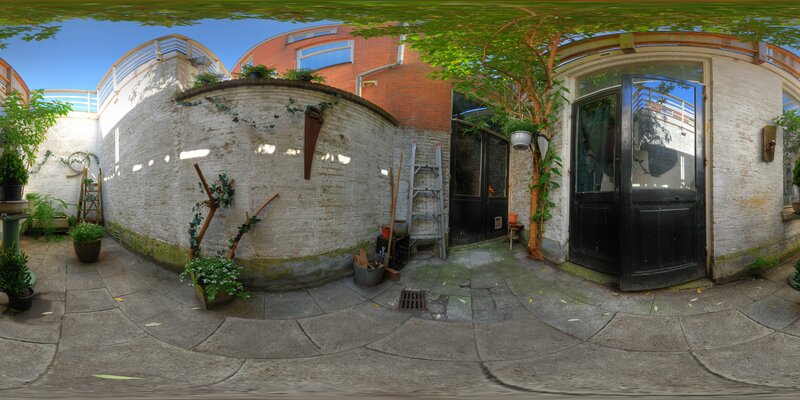 Courtyard with brick walls and plants