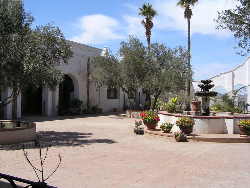Courtyard with fountain and palm trees