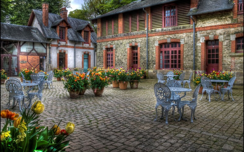 Courtyard with Tables and Flowers