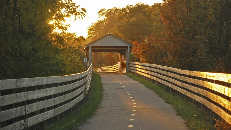 covered bridge at sunset