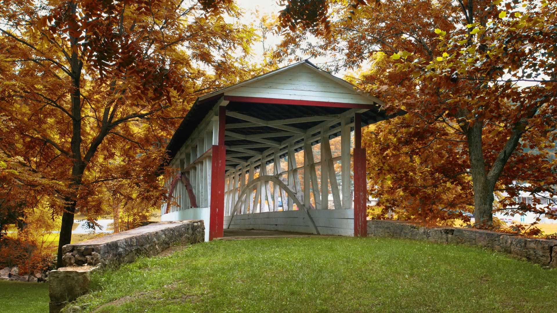 covered bridge in autumn
