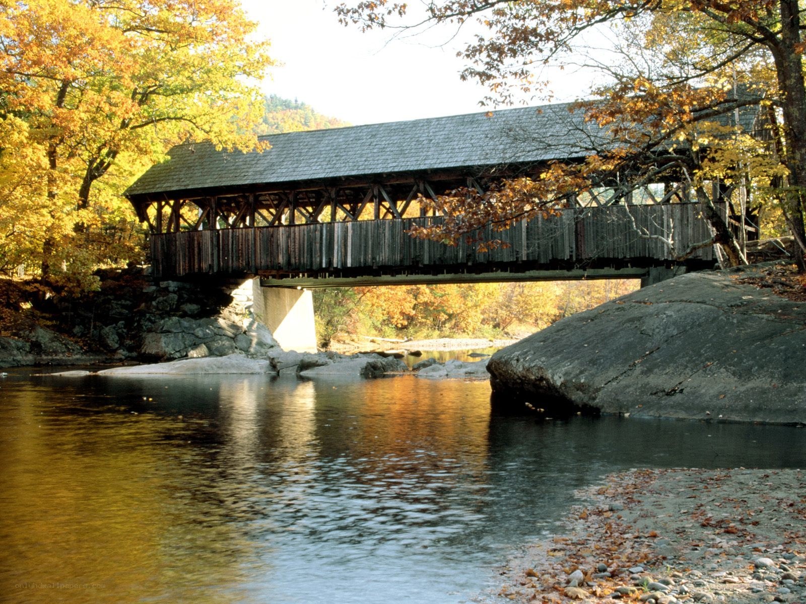 covered bridge in autumn