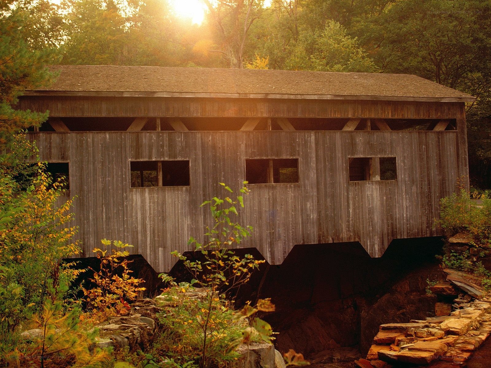 covered bridge in autumn