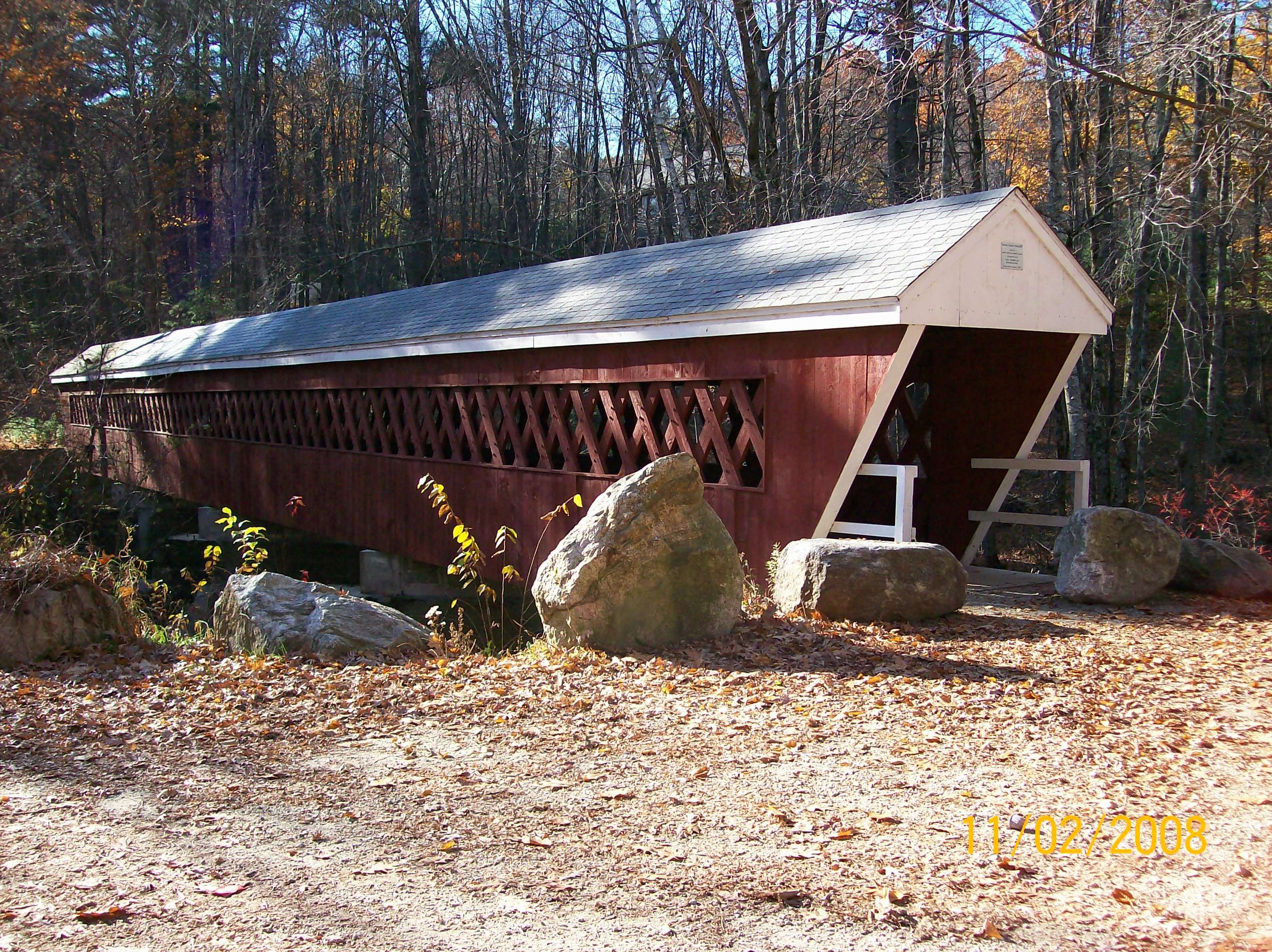covered bridge in autumn