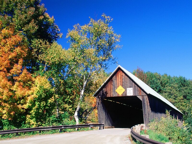 covered bridge in autumn