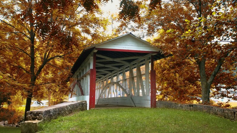 covered bridge in autumn