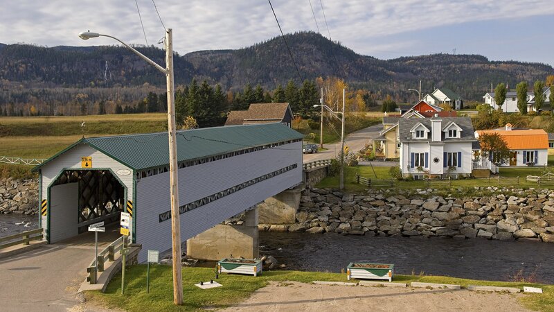 covered bridge in rural village