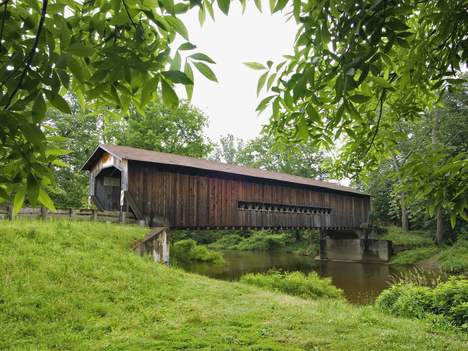 covered bridge over river