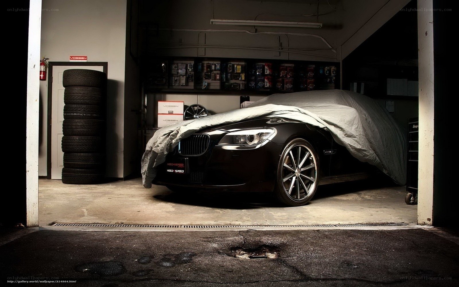 Covered car in garage