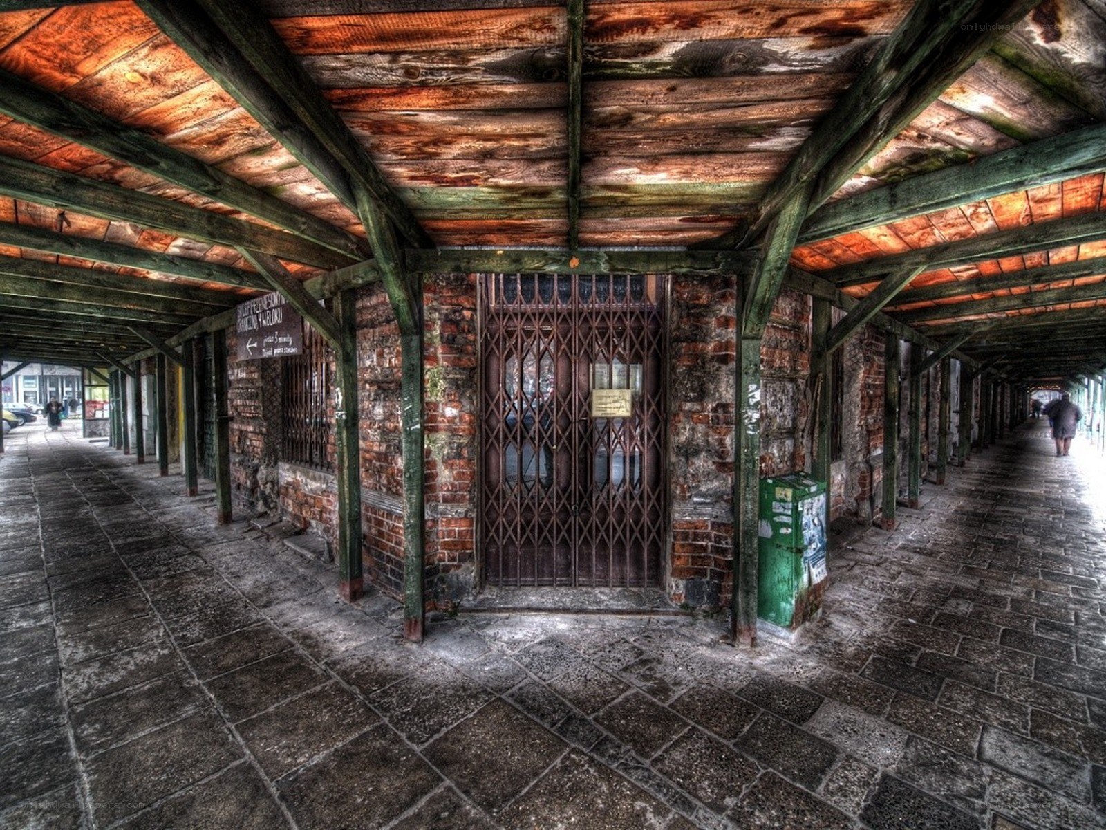 Covered walkway with brick walls