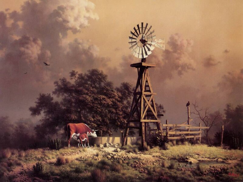 Cow and windmill at dusk