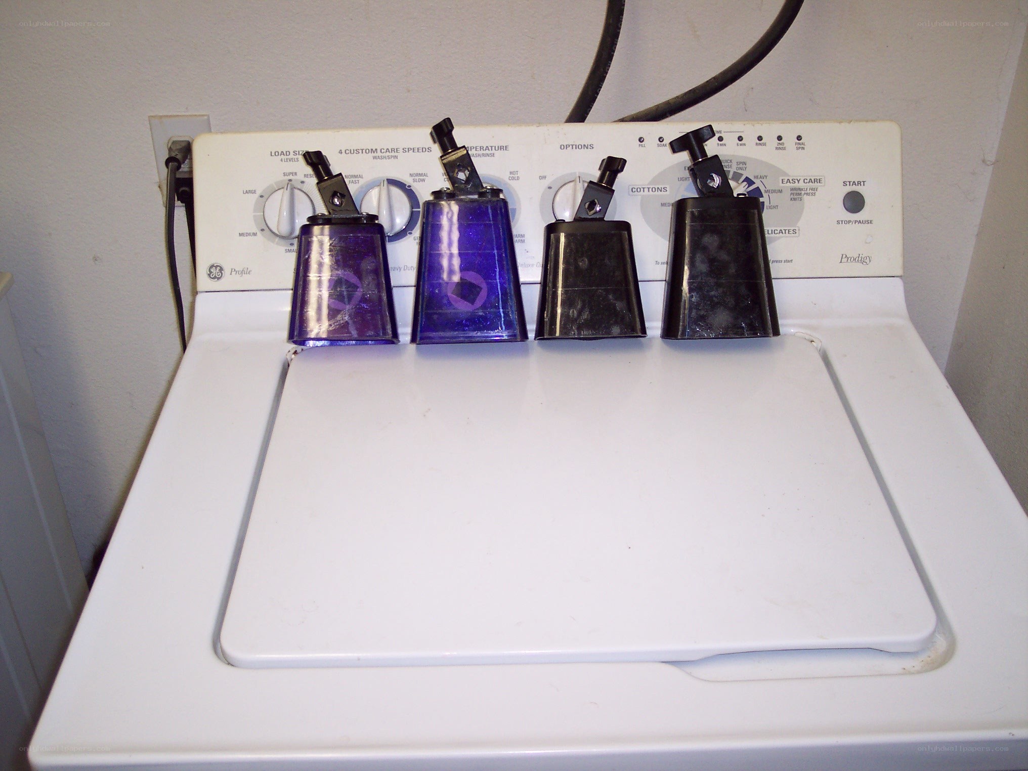 Cowbells on a washing machine