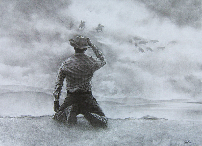 Cowboy watching cattle drive