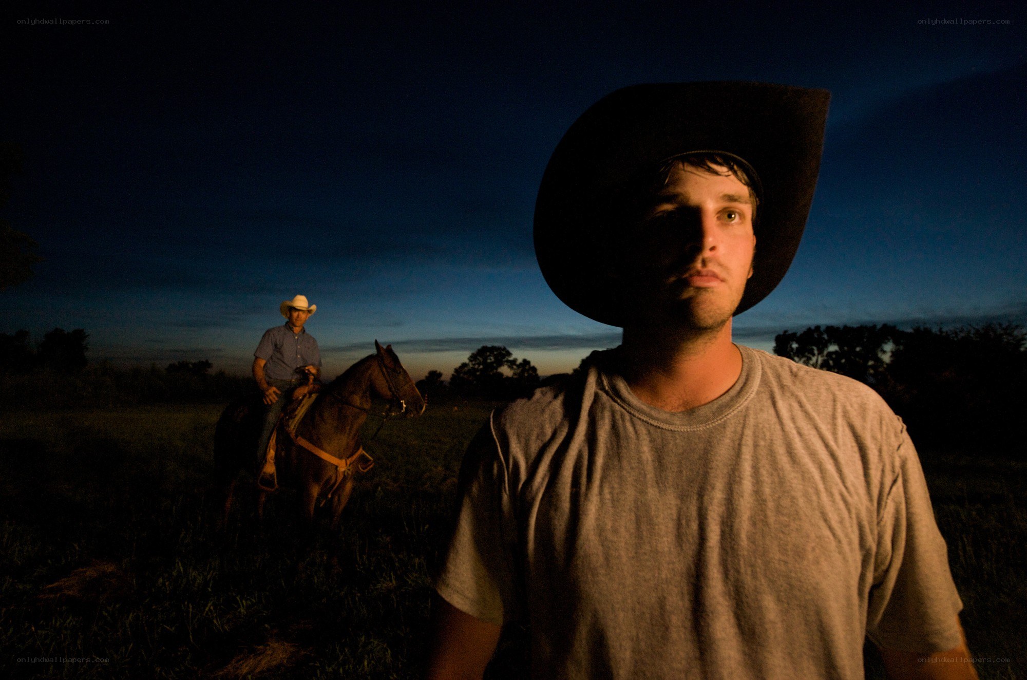 Cowboys at dusk