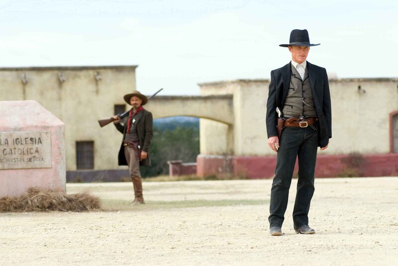 Cowboys in a dusty town