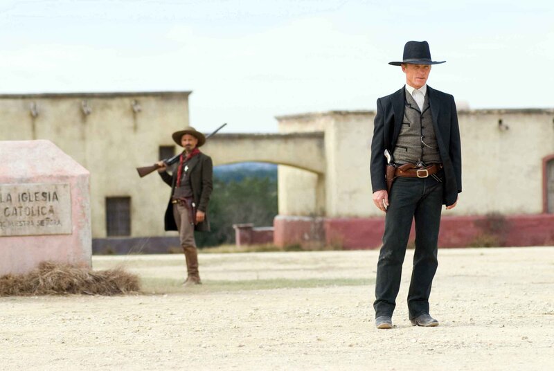 Cowboys in a dusty town