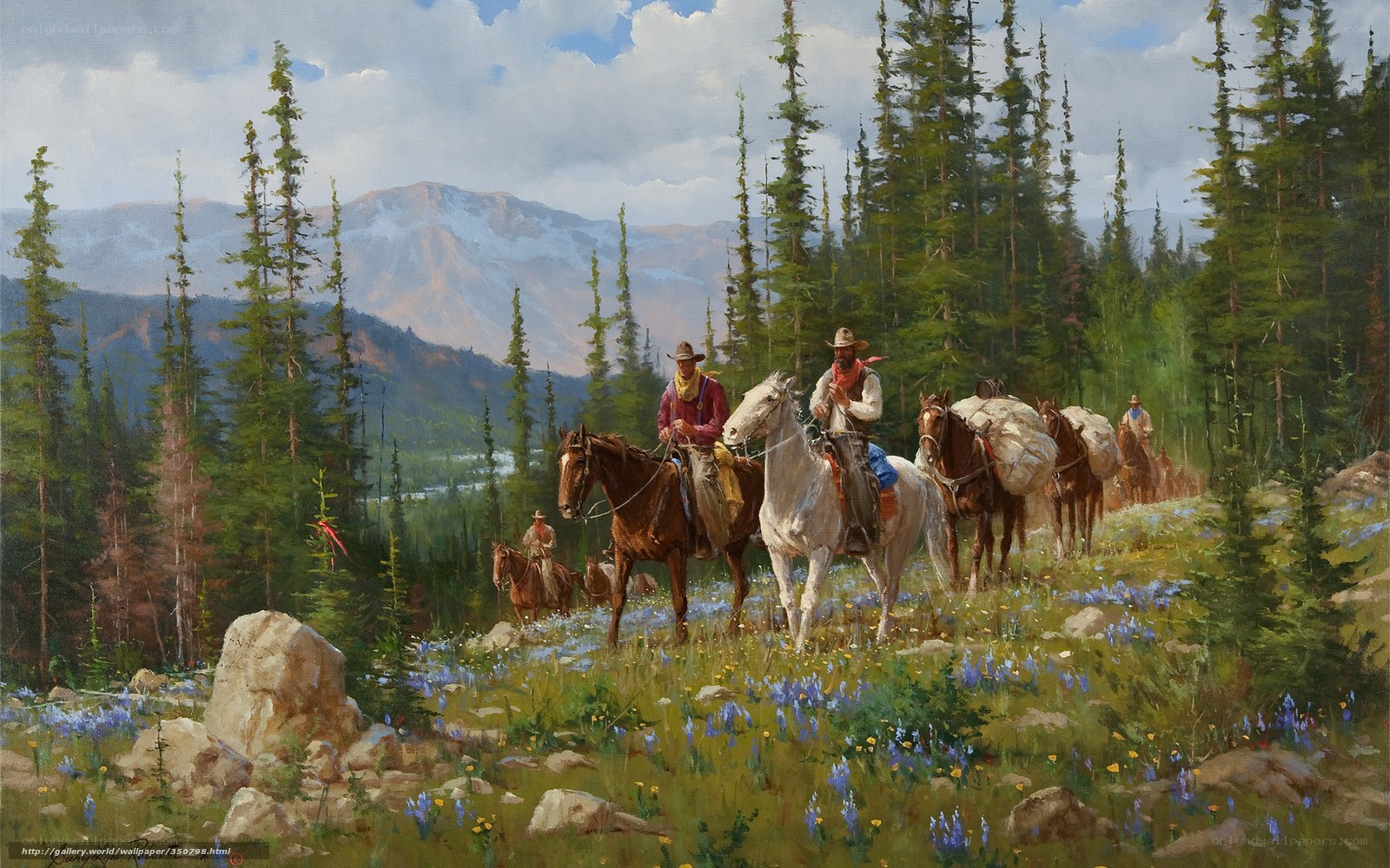 Cowboys on a mountain trail