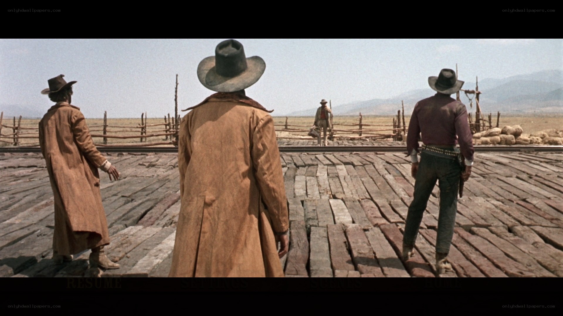 Cowboys on a train trestle