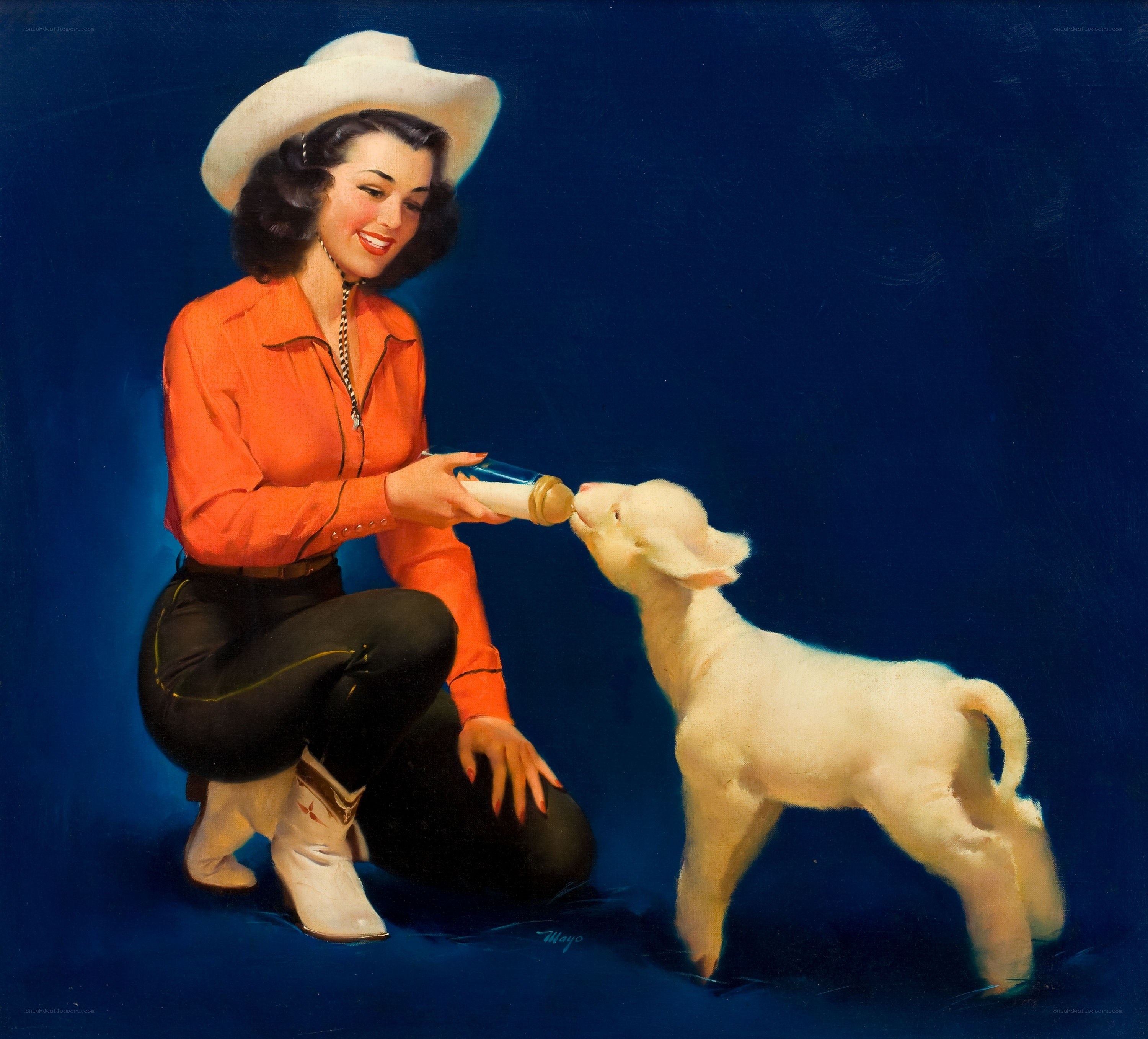 cowgirl feeding a lamb