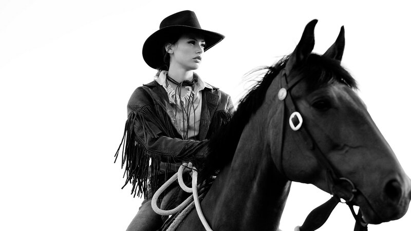 cowgirl on horseback