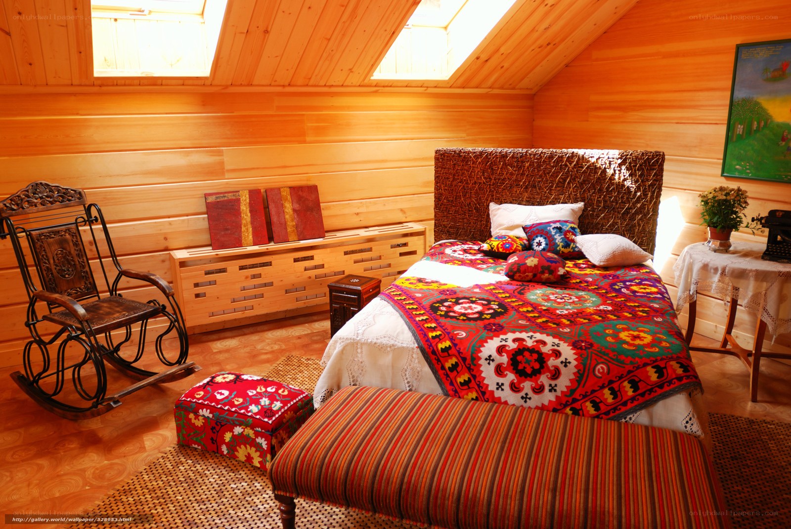 Cozy attic bedroom with wooden walls