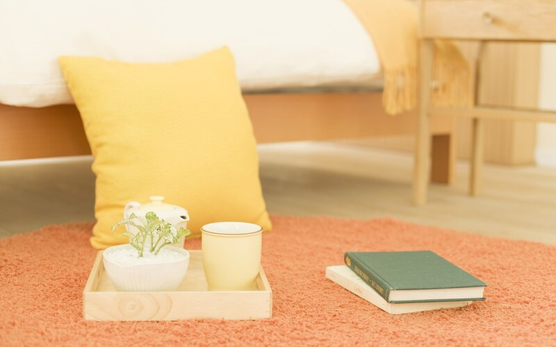 Cozy bedroom corner with tray