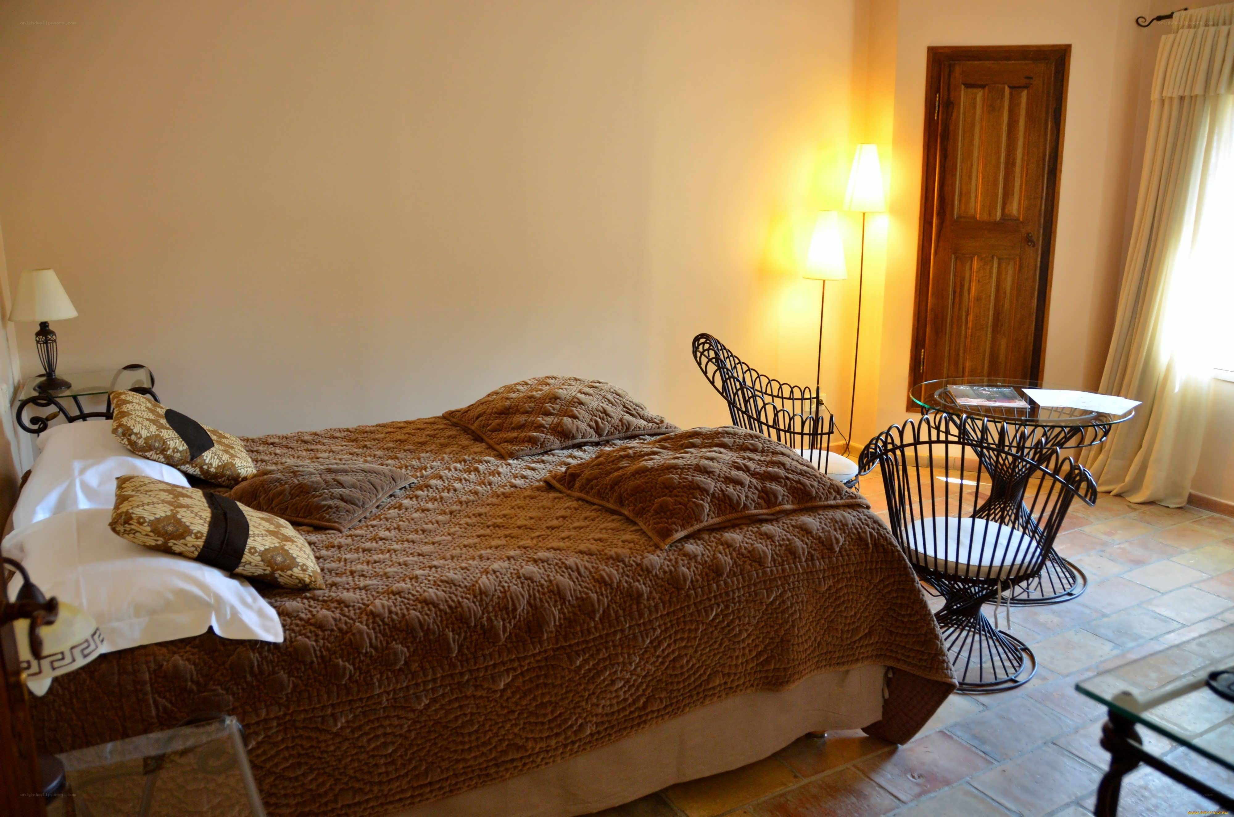 Cozy bedroom with brown bedding