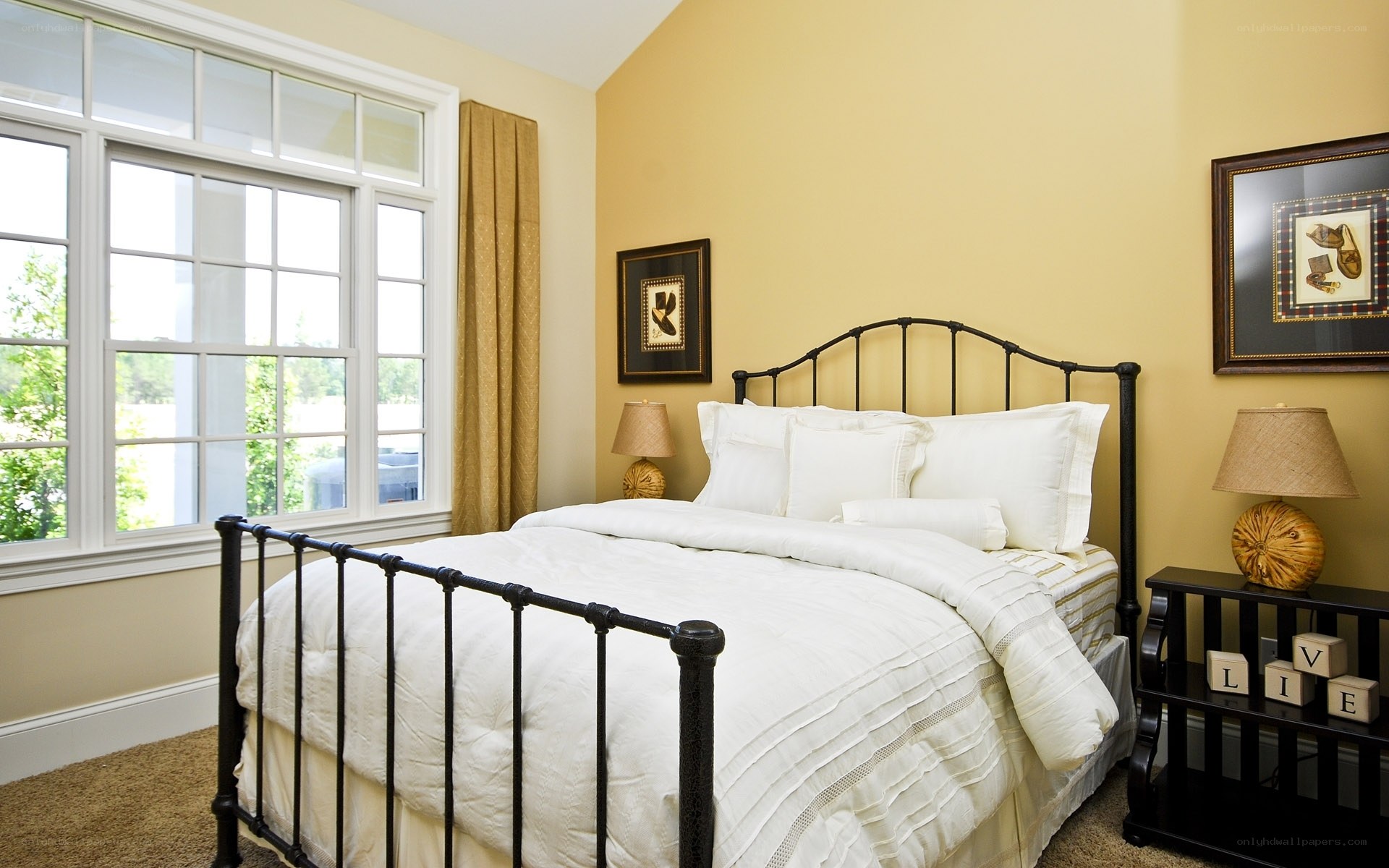 Cozy bedroom with iron bed