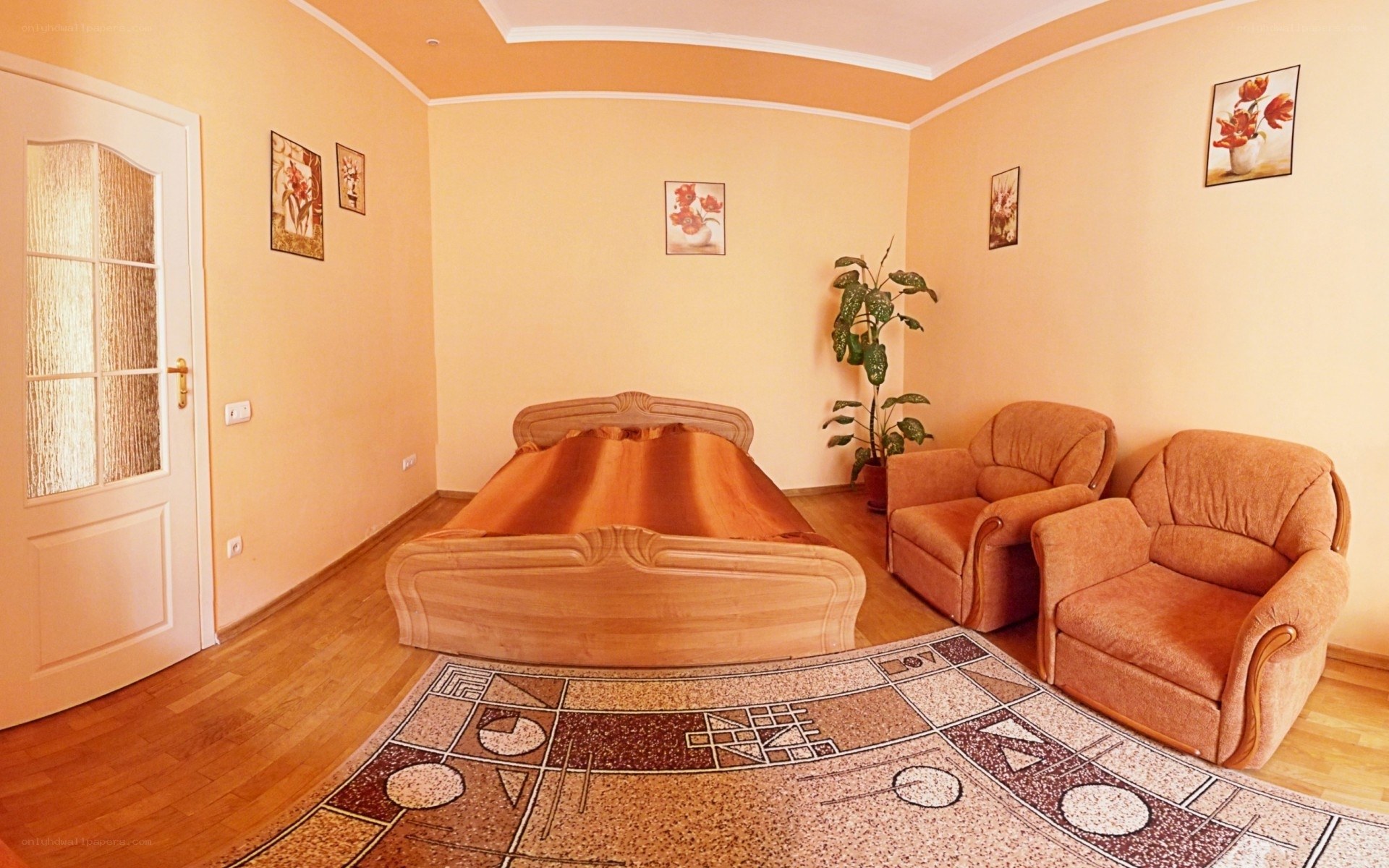Cozy bedroom with two armchairs