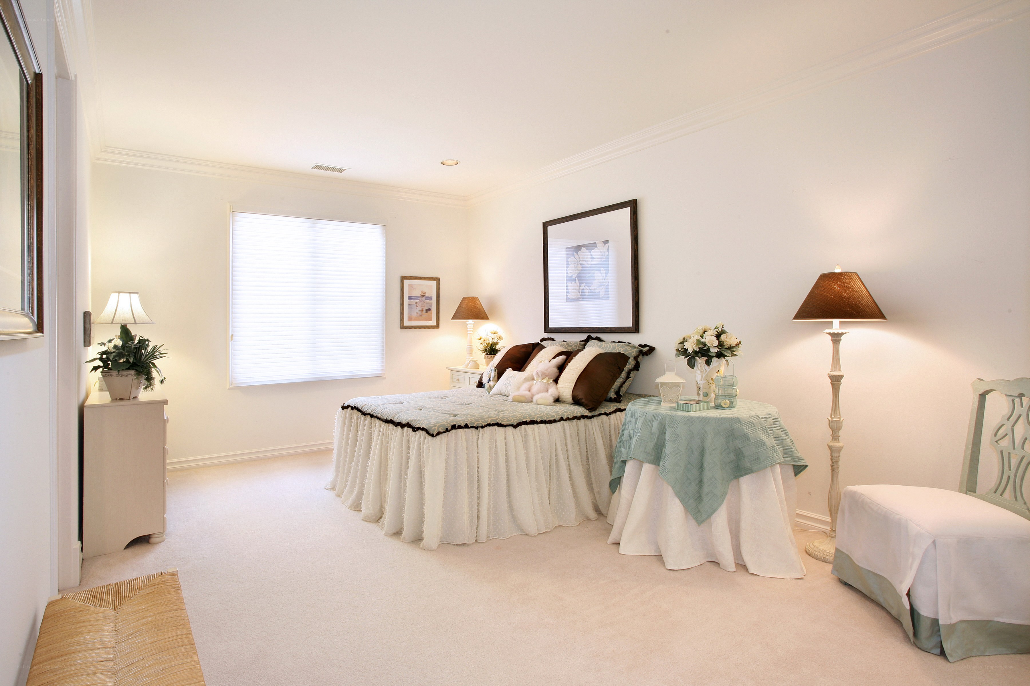 cozy bedroom with white and mint decor