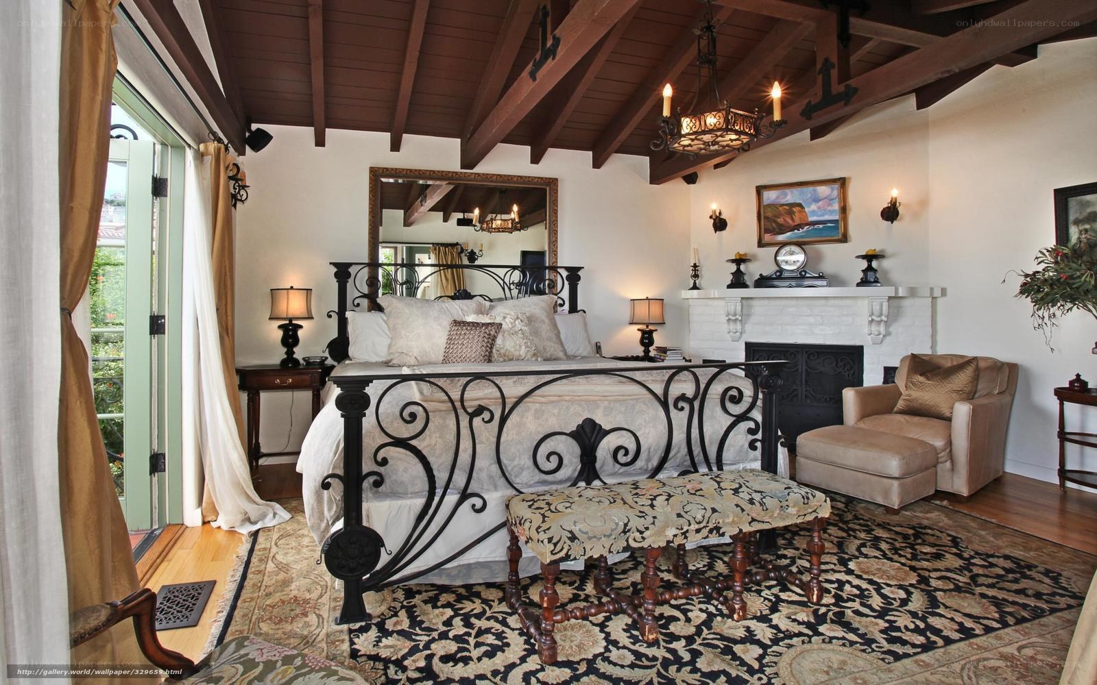 cozy bedroom with wrought iron bed