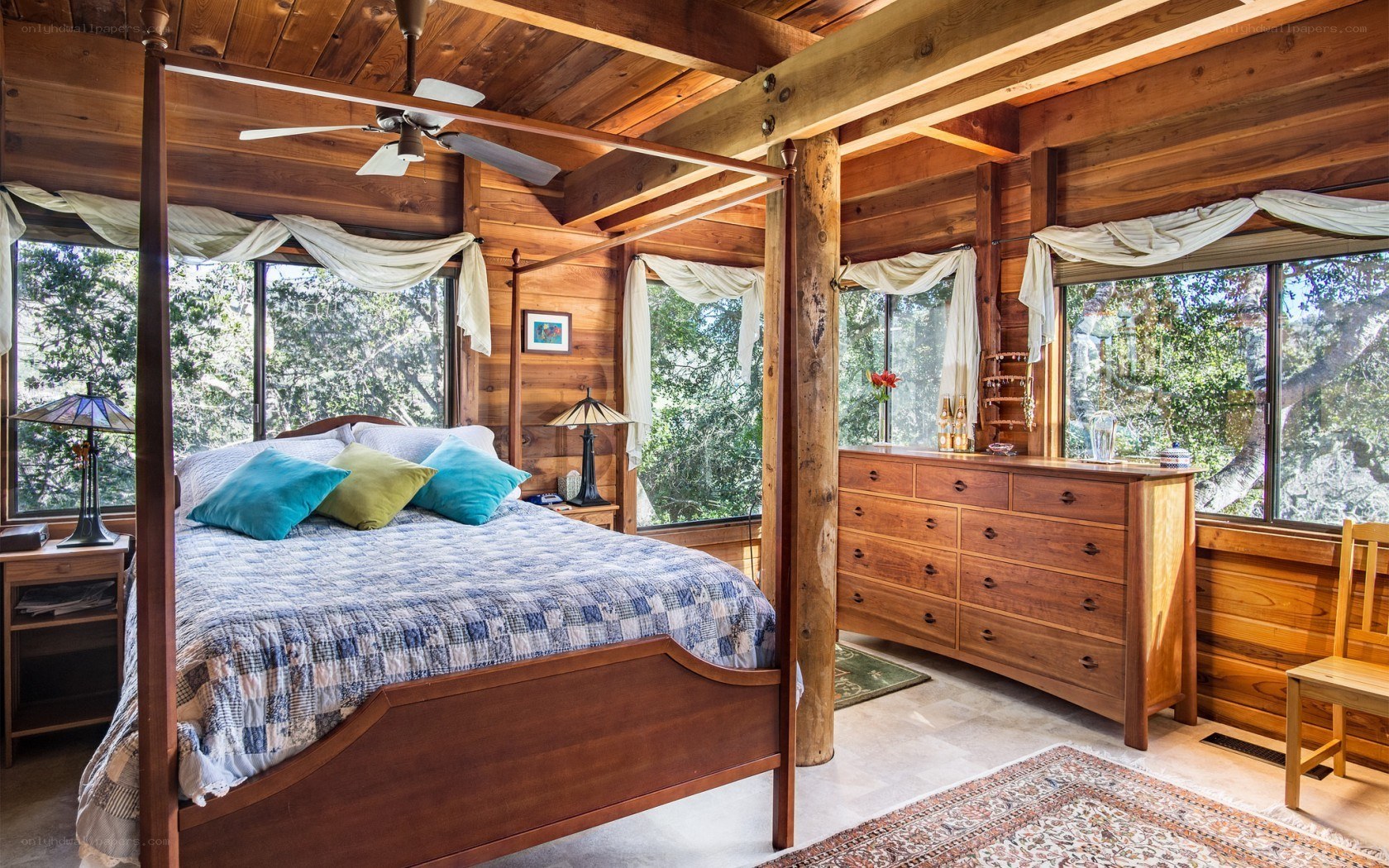 Cozy cabin bedroom with forest view