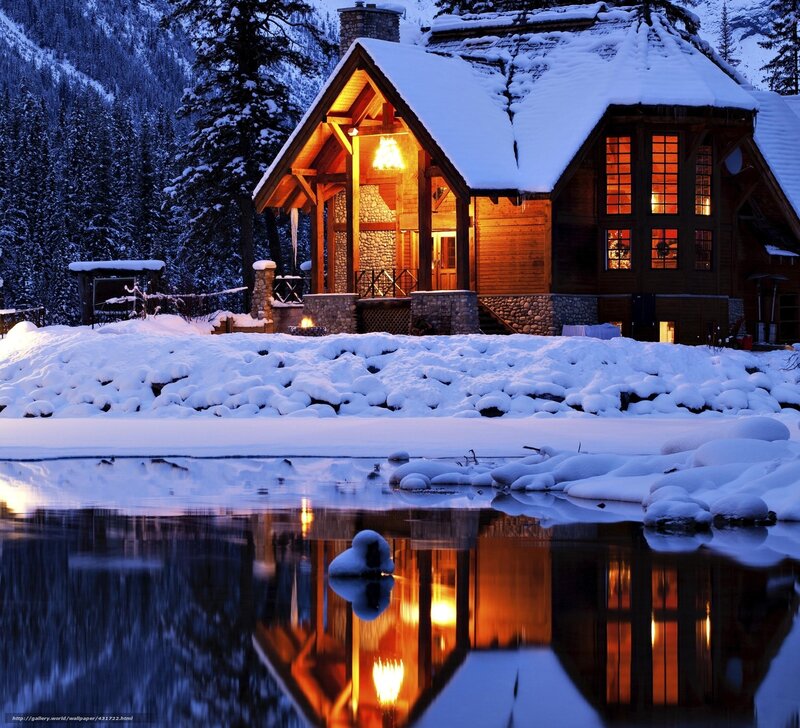 Cozy cabin in snowy landscape