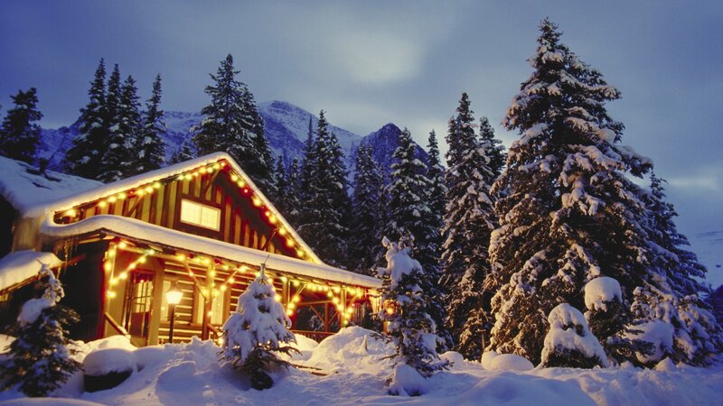 Cozy cabin in snowy mountains