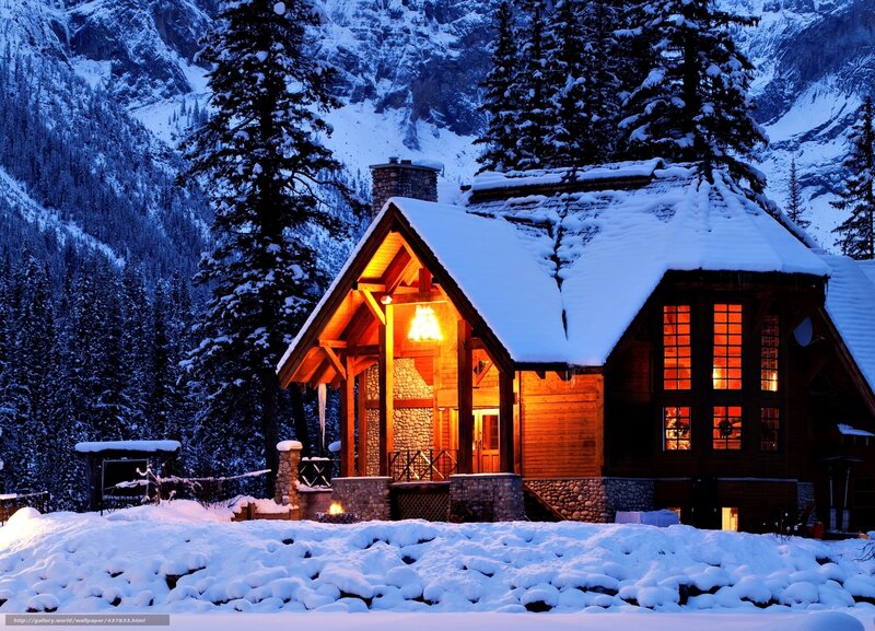 Cozy cabin in snowy mountains