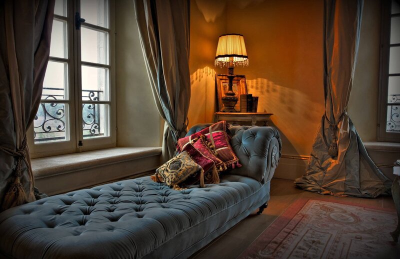 Cozy chaise lounge in a sunlit room