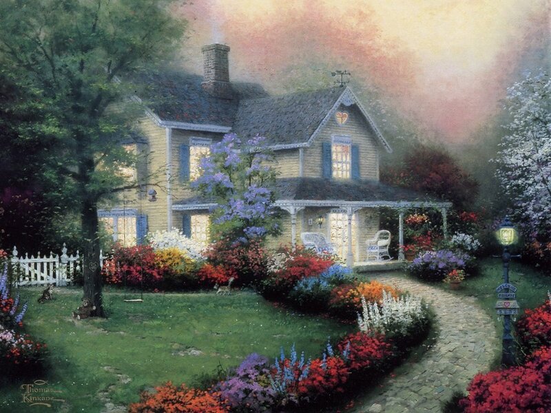 Cozy cottage in a flower garden