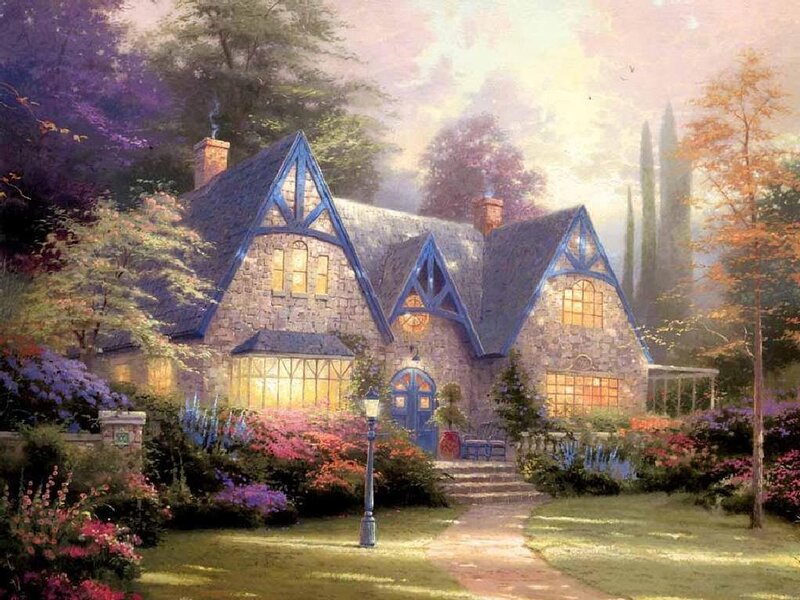 Cozy cottage in a flower garden