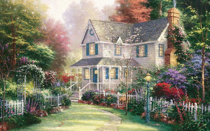 Cozy cottage in a flower garden