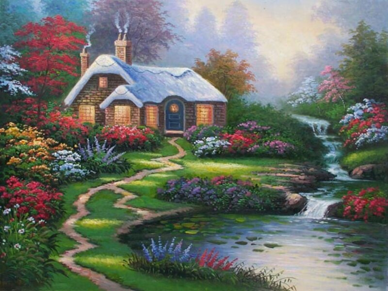 Cozy cottage in a flower garden