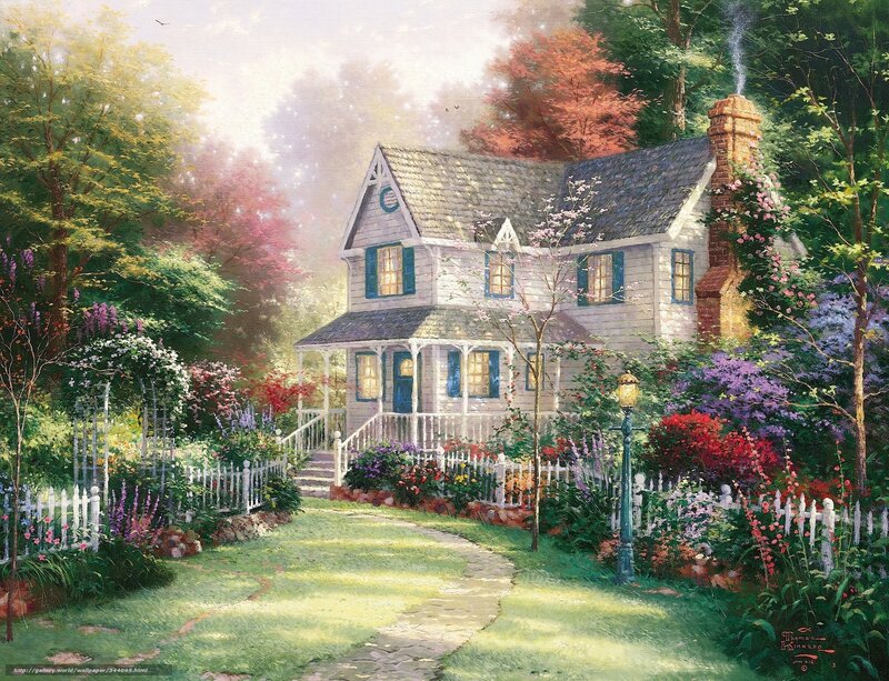 Cozy cottage in a flower garden