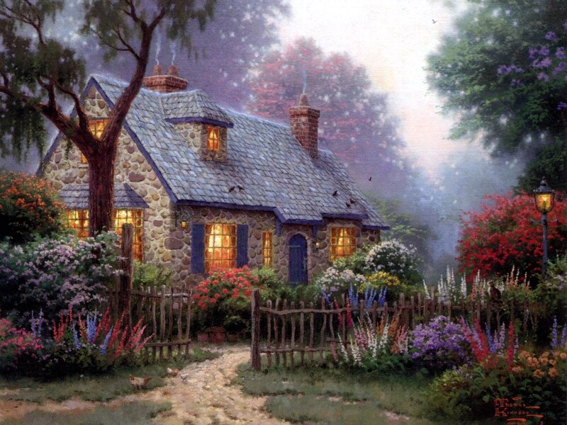 Cozy cottage in a misty garden