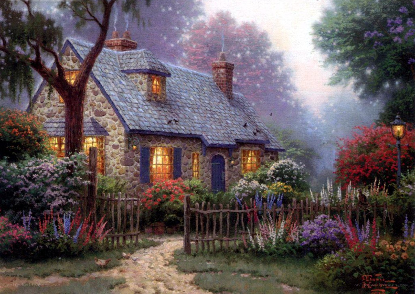 Cozy cottage in a misty garden