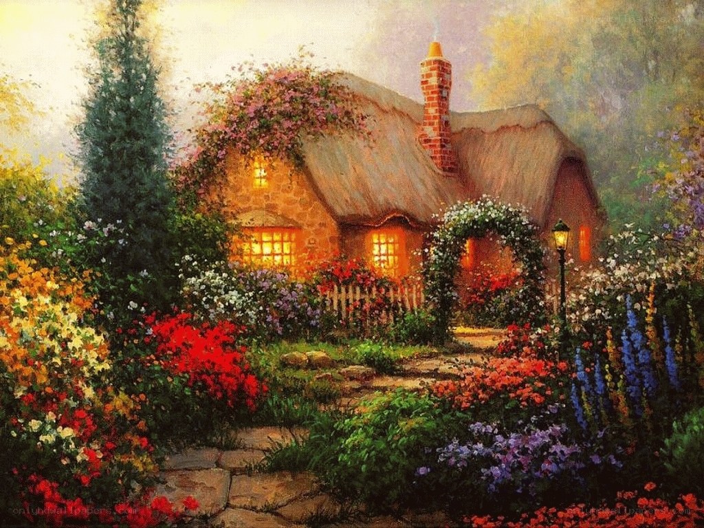 Cozy cottage in flower garden