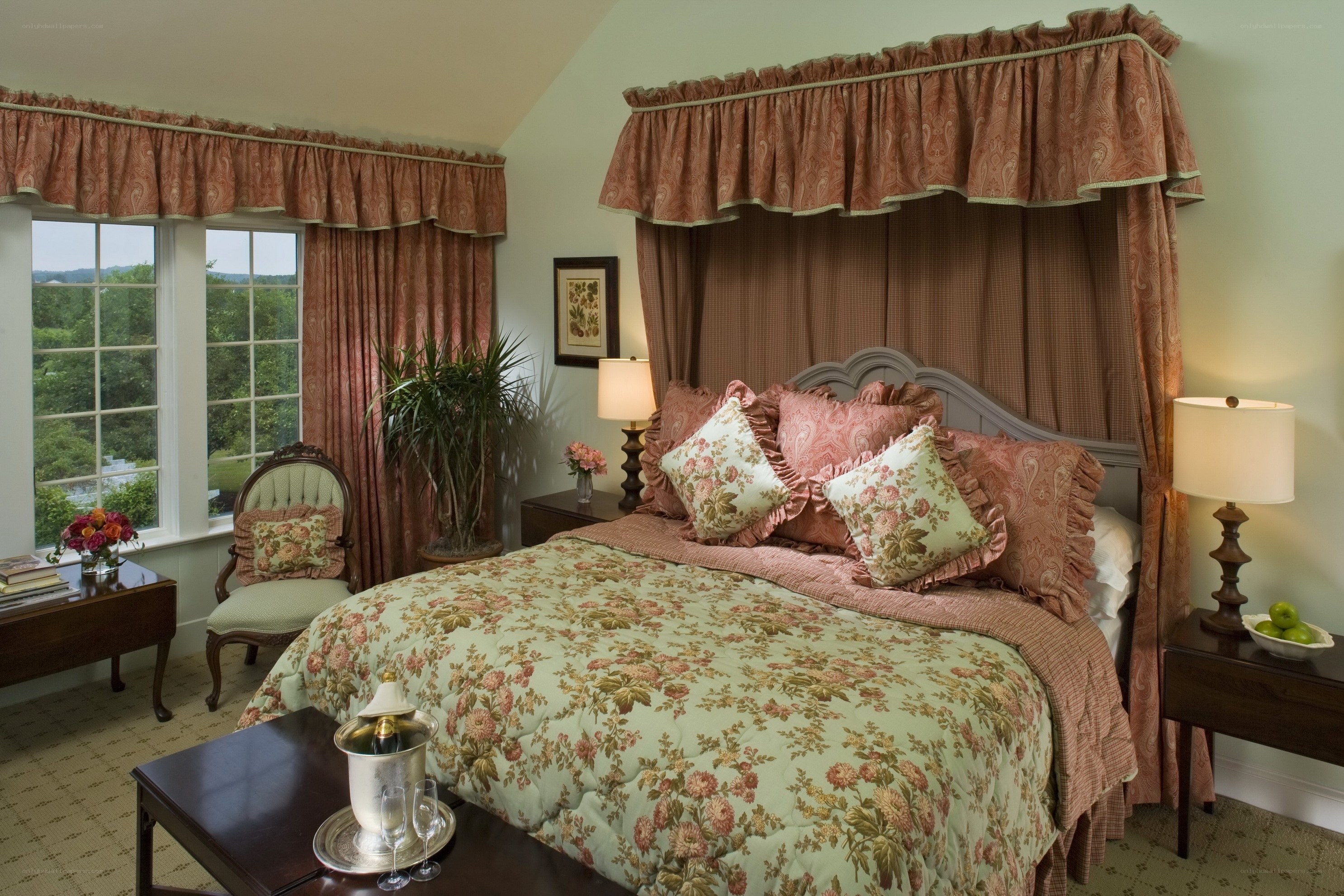 Cozy floral bedroom with canopy bed