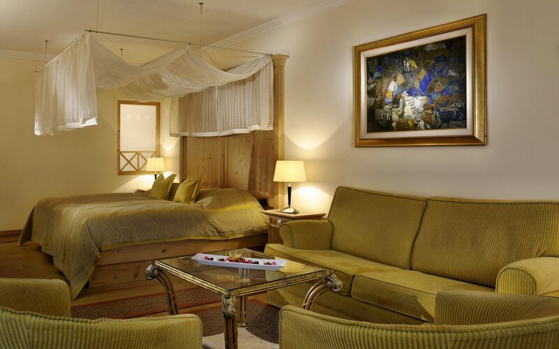 cozy hotel room with canopy bed