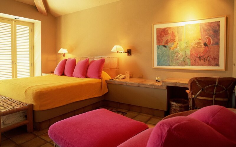 Cozy hotel room with vibrant decor