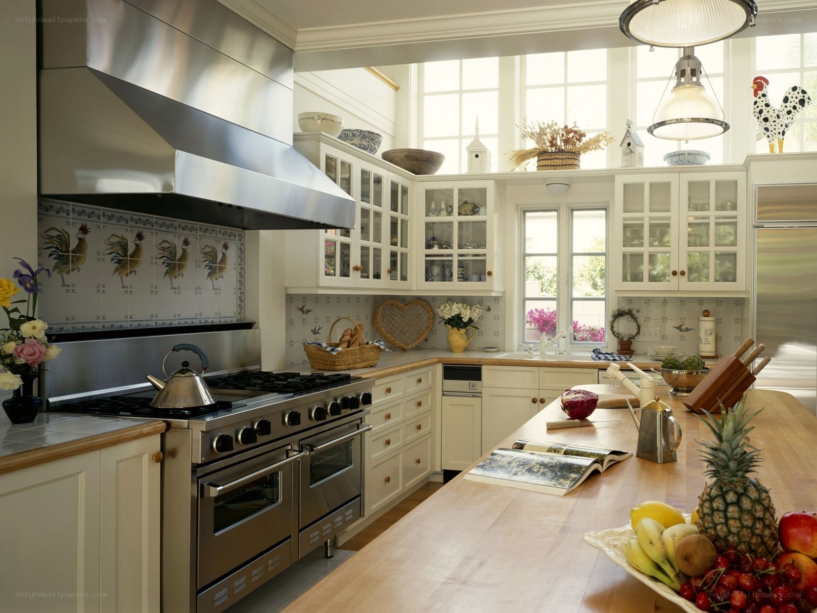 cozy kitchen with rooster tiles